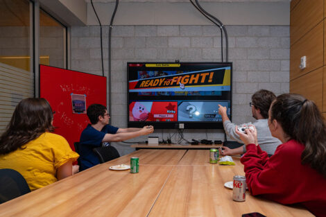 Students engage in a video game night.