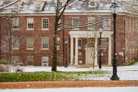 A campus building in the snow.